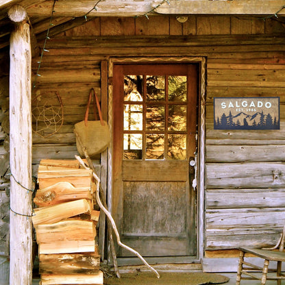 Personalized Rustic Wooden Family Name Sign With Mountain, Trees, and a Wolf